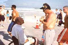 OAC evangelist sharing the gospel at the beach