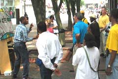 OAC trainee preaching on the street in Baltimore