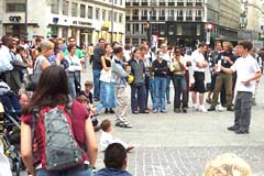 Student missionary sharing the gospel with a crowd in Austria