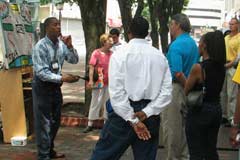 OAC trainee preaching at Lexington Market in downtown Baltimore