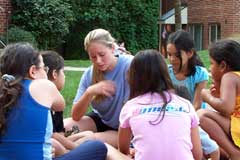 Student missionary sharing the gospel with inner-city children