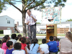 OAC staff member sharing the gospel with a child