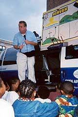 OAC evangelist conducting a childrens meeting in a Boston neighborhood