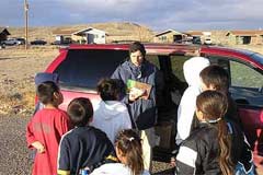 OAC evangelist sharing the gospel to kids on the Indian reservation